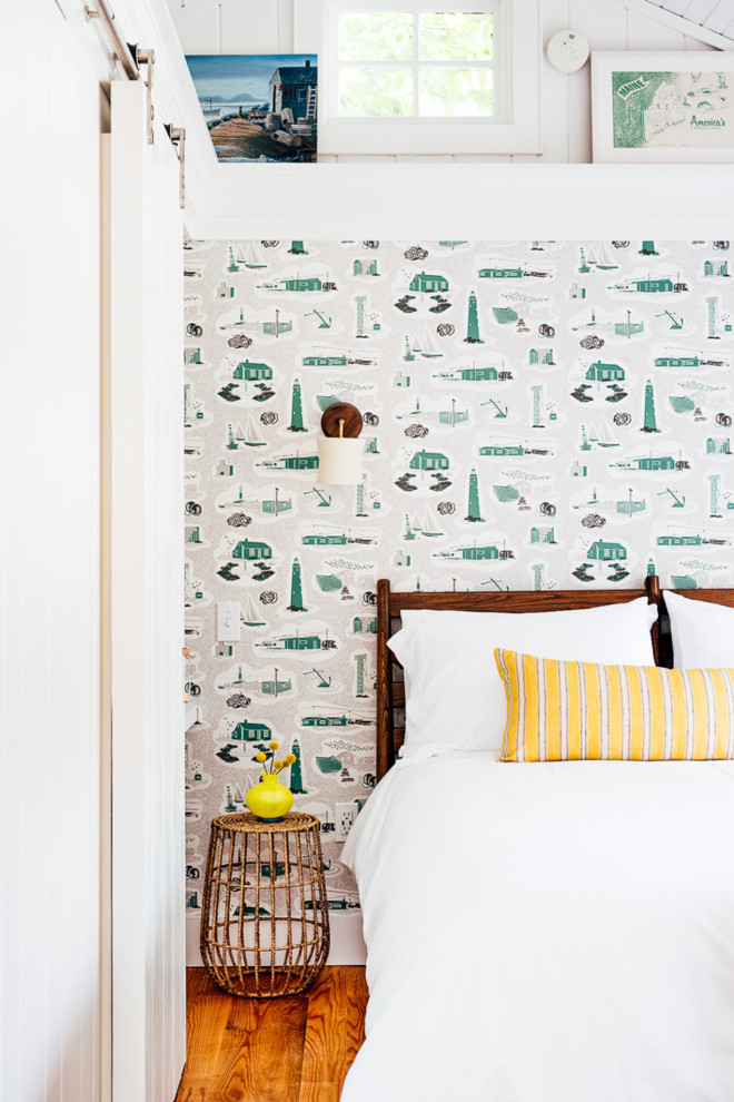 Inspiration for a coastal bedroom remodel in Portland Maine with white walls