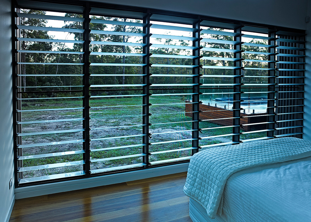 Example of a trendy bedroom design in Sunshine Coast