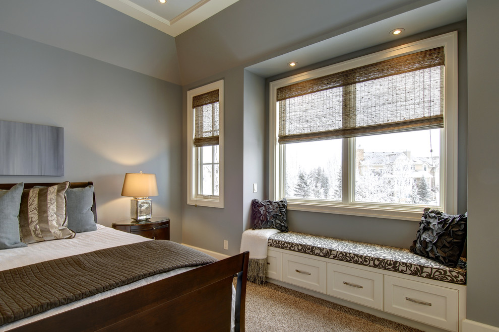 Elegant bedroom photo in Calgary with gray walls