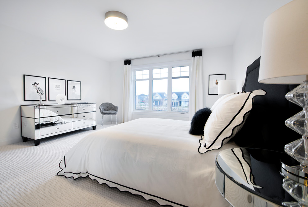 На фото: спальня среднего размера в современном стиле с ковровым покрытием с