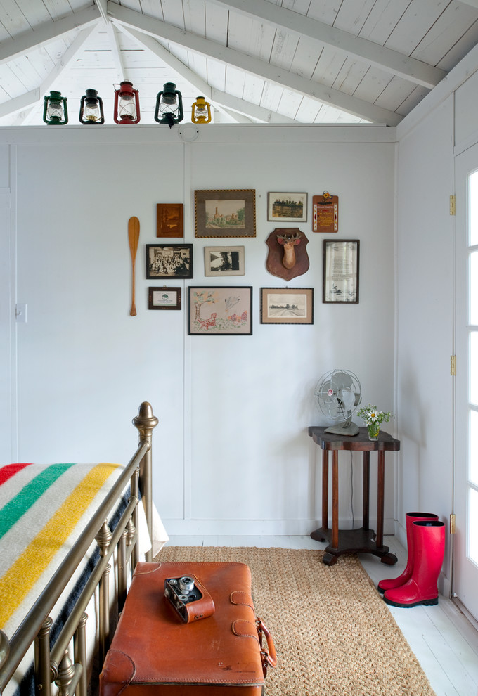 Bedroom - coastal painted wood floor bedroom idea in Chicago with white walls