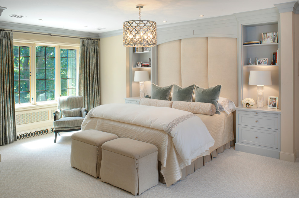 Example of a transitional carpeted bedroom design in Columbus with beige walls