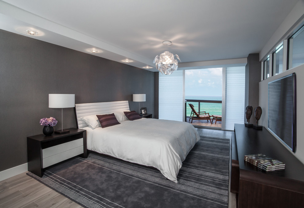 Design ideas for a contemporary master bedroom in Miami.