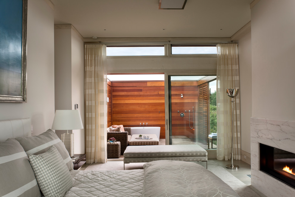 Идея дизайна: спальня в современном стиле с белыми стенами и горизонтальным камином