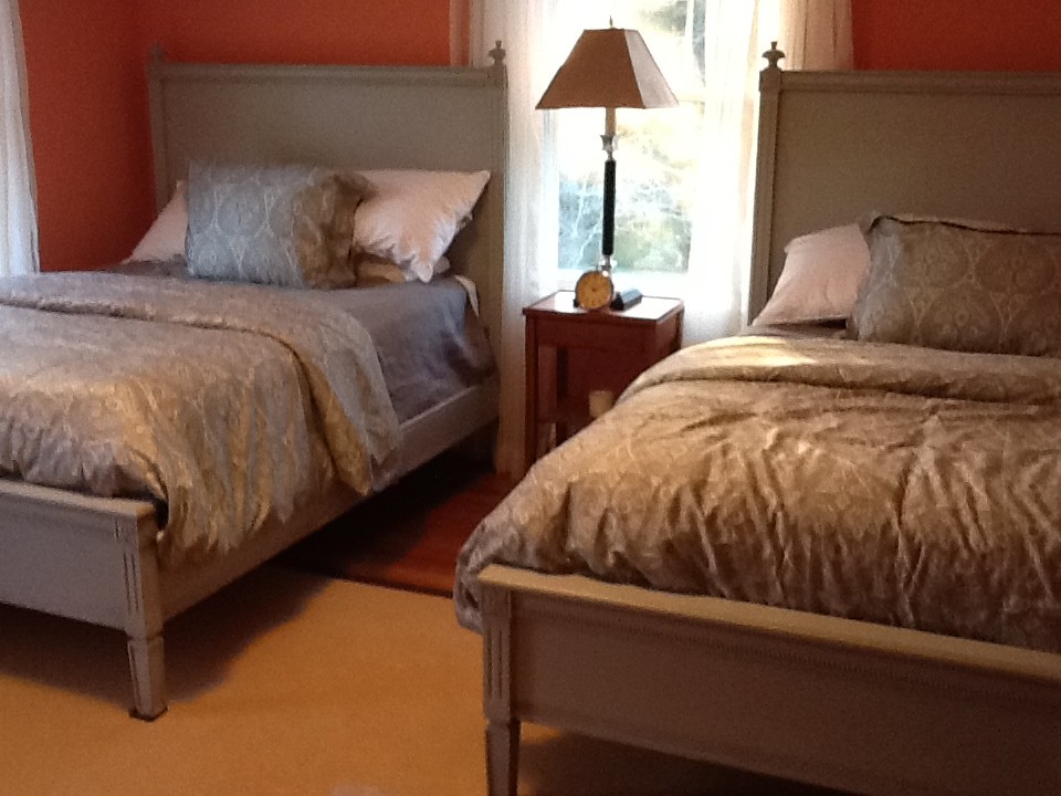 This is an example of a coastal bedroom in New York.