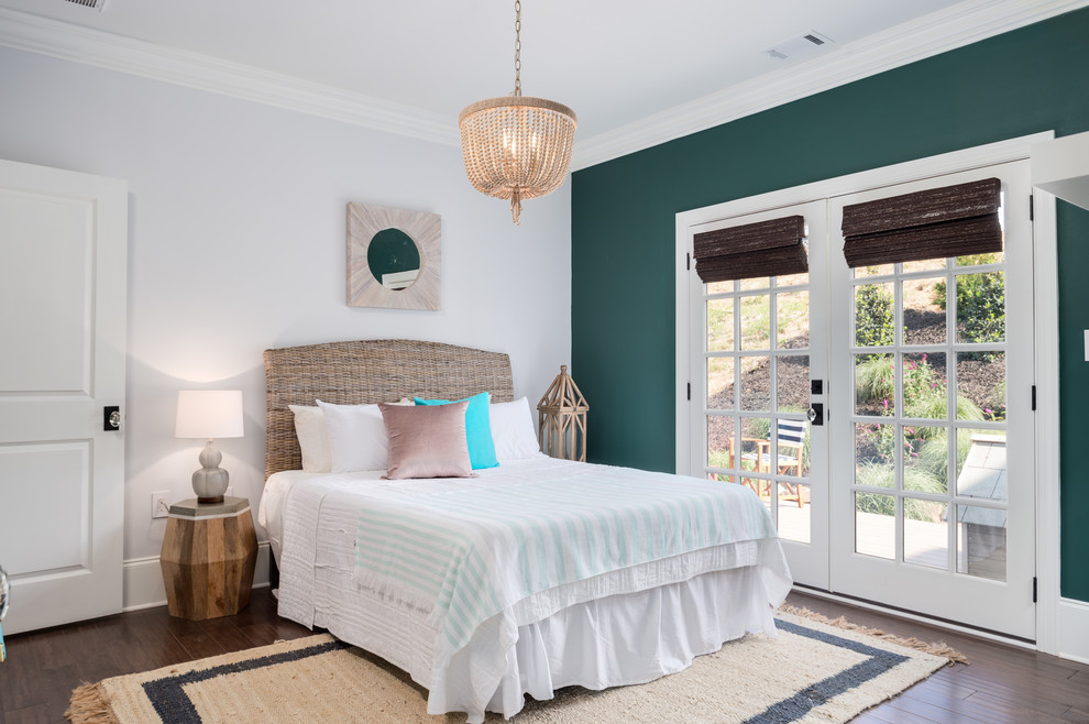 Nautical master and grey and brown bedroom in Atlanta with dark hardwood flooring, brown floors and multi-coloured walls.