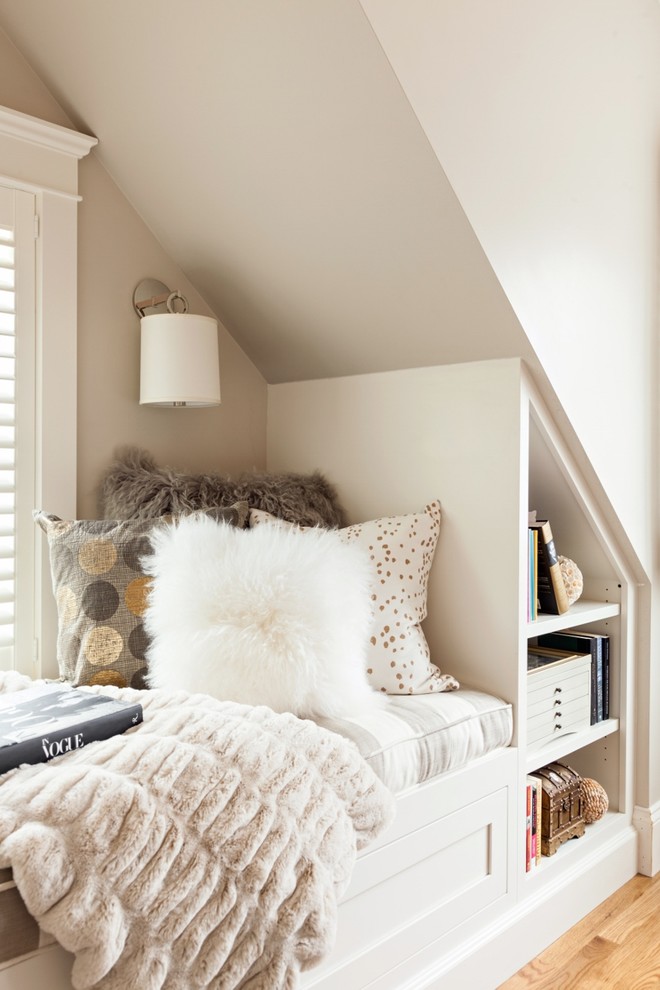 This is an example of a beach style bedroom in Boston with beige walls.