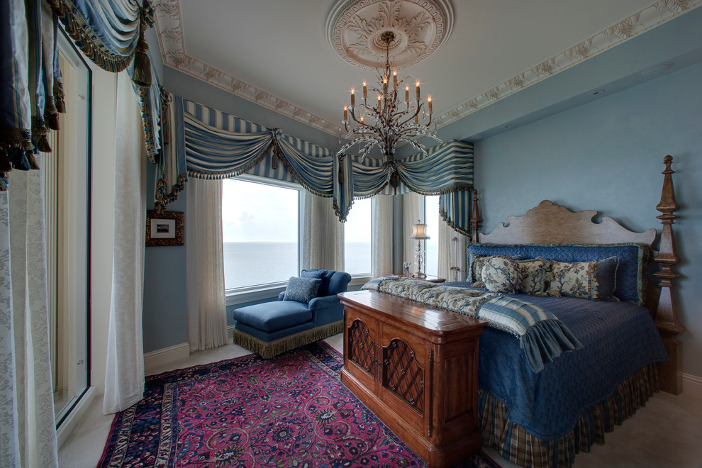 Mediterranean bedroom in Miami with blue walls.