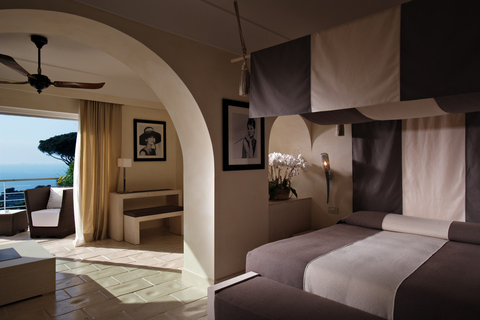 Design ideas for a mediterranean grey and cream bedroom in Rome.