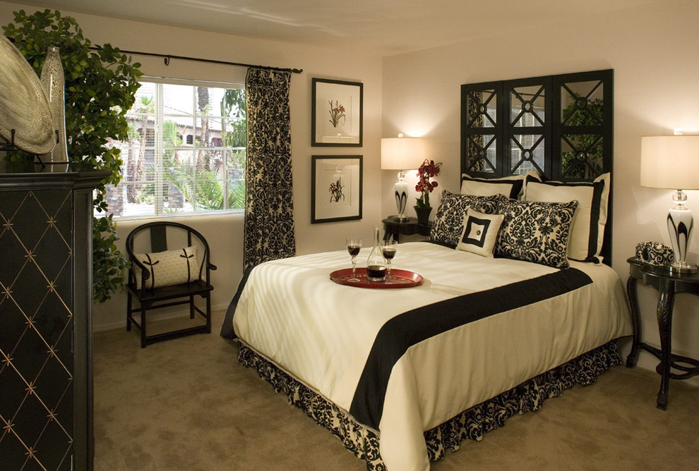Cette image montre une chambre avec moquette design avec un mur blanc et aucune cheminée.