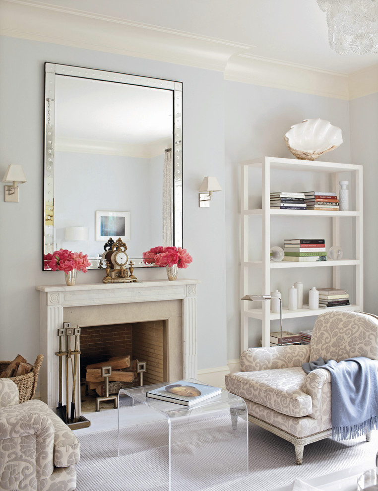 Inspiration for a timeless master bedroom remodel in New York with gray walls and a standard fireplace