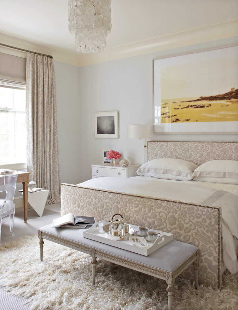 Design ideas for a traditional master bedroom in New York with grey walls.