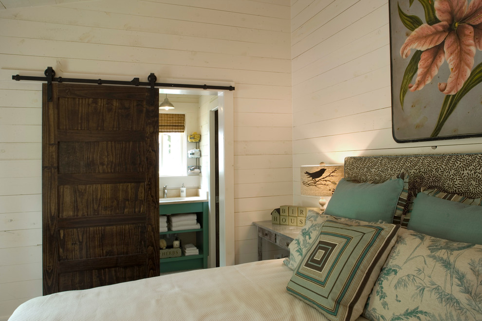 Example of a mountain style bedroom design in Atlanta with white walls