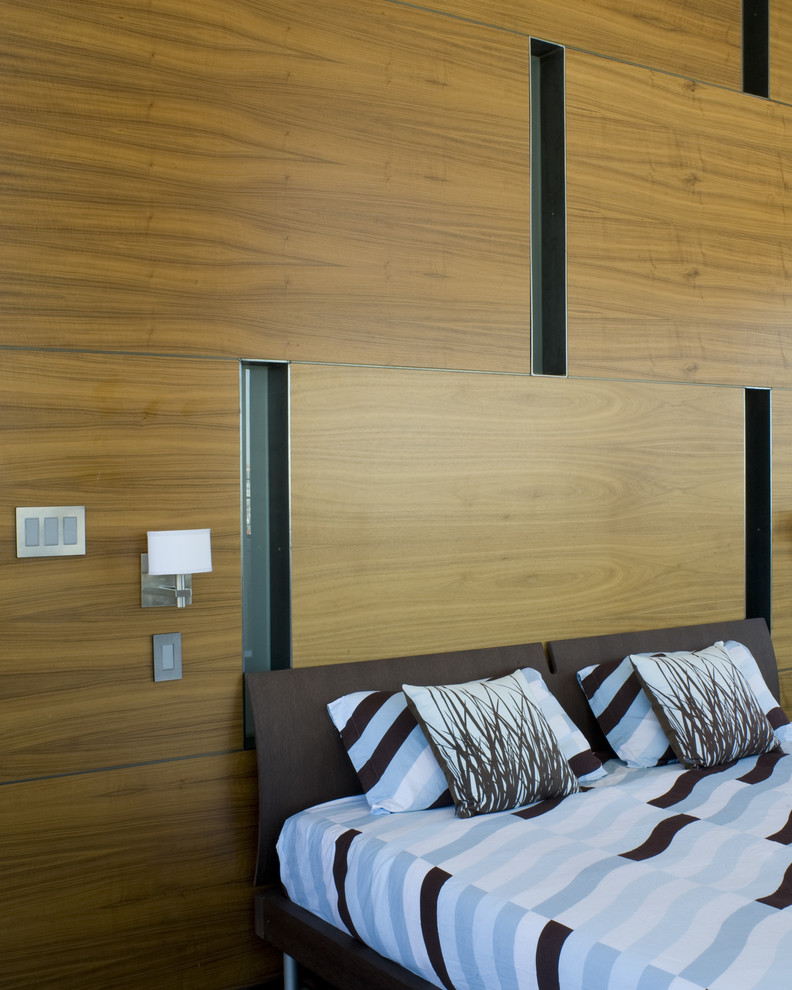 Photo of a contemporary bedroom in San Francisco with beige walls.