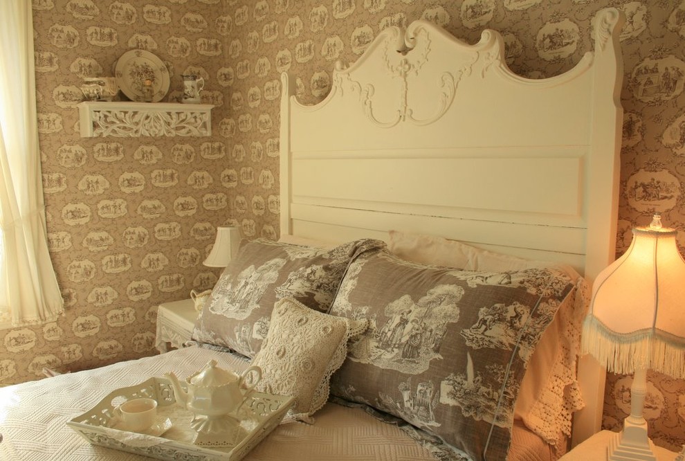 Inspiration for a traditional bedroom in Other with beige walls.