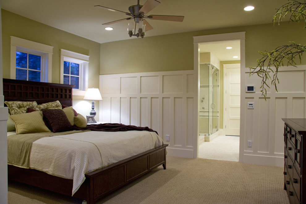 Design ideas for a large traditional master bedroom in Salt Lake City with green walls, carpet and beige floors.