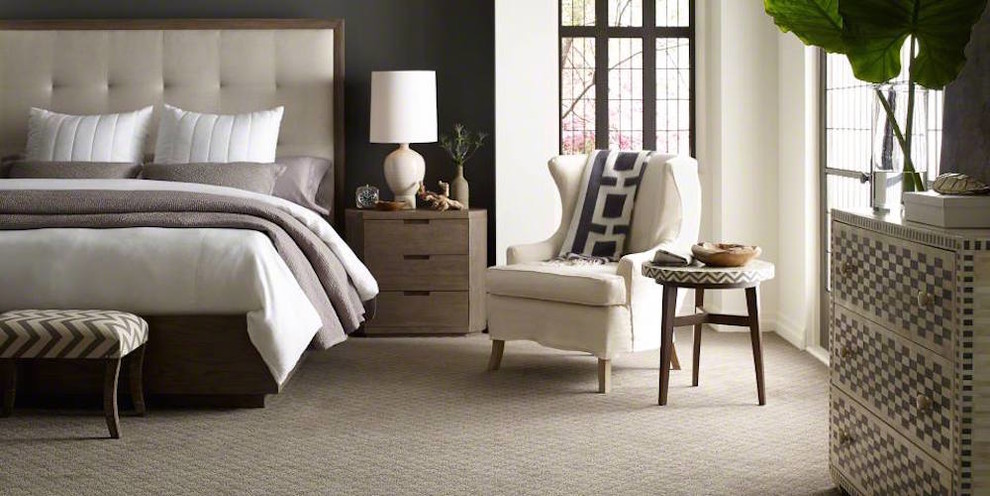 Transitional carpeted and beige floor bedroom photo in Austin with black walls