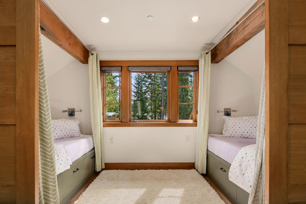 Medium sized traditional master bedroom in Seattle with beige walls, medium hardwood flooring and no fireplace.