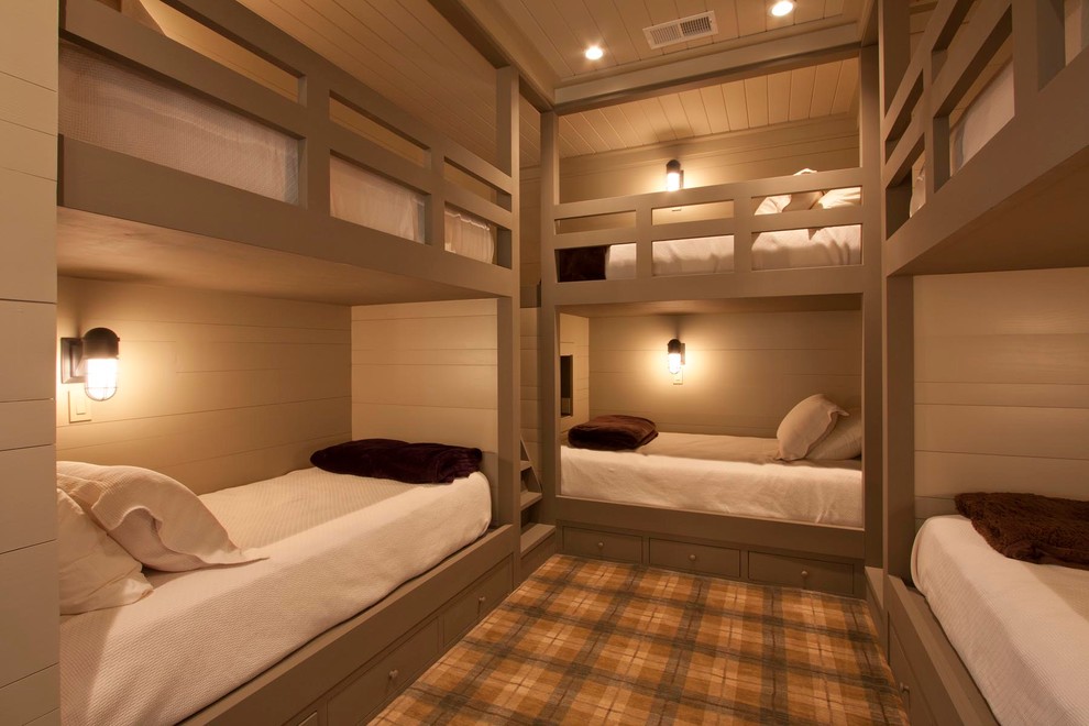 Example of a mountain style guest carpeted bedroom design in Other with beige walls