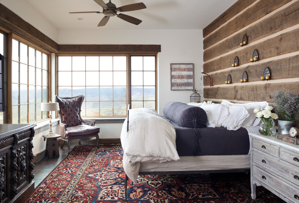 Mid-sized cottage master carpeted bedroom photo in Denver with white walls