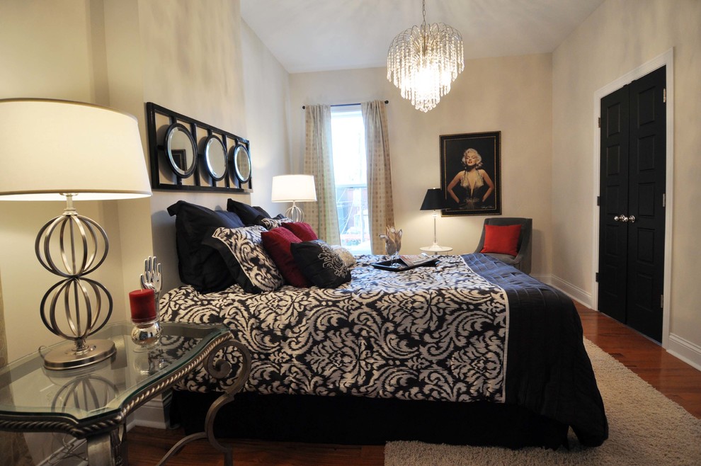 Design ideas for a medium sized contemporary master bedroom in St Louis with medium hardwood flooring.