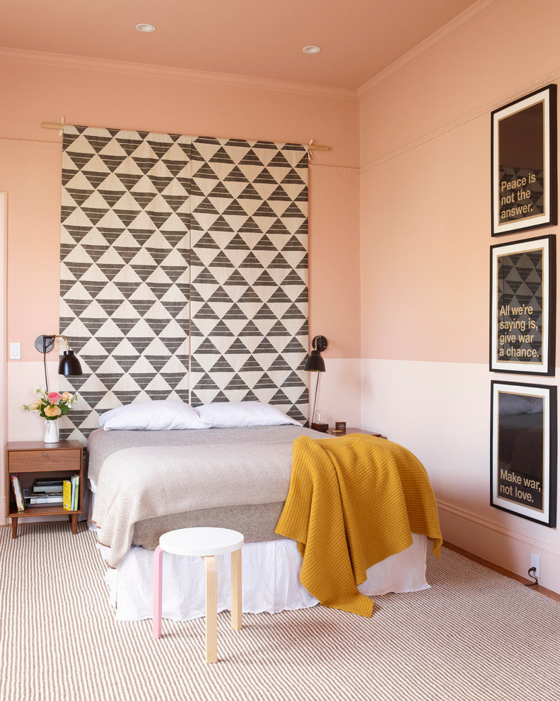 Inspiration for an eclectic bedroom remodel in San Francisco with pink walls