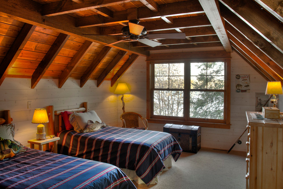 Inspiration for a rustic bedroom in Minneapolis with carpet.