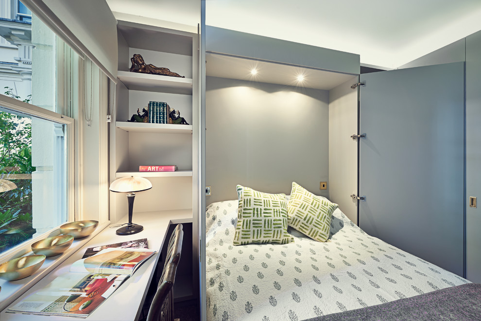 Bedroom - small transitional guest bedroom idea in London with gray walls and no fireplace