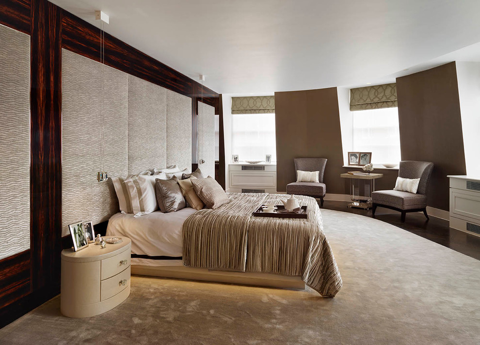 This is an example of a contemporary bedroom in London with brown walls.