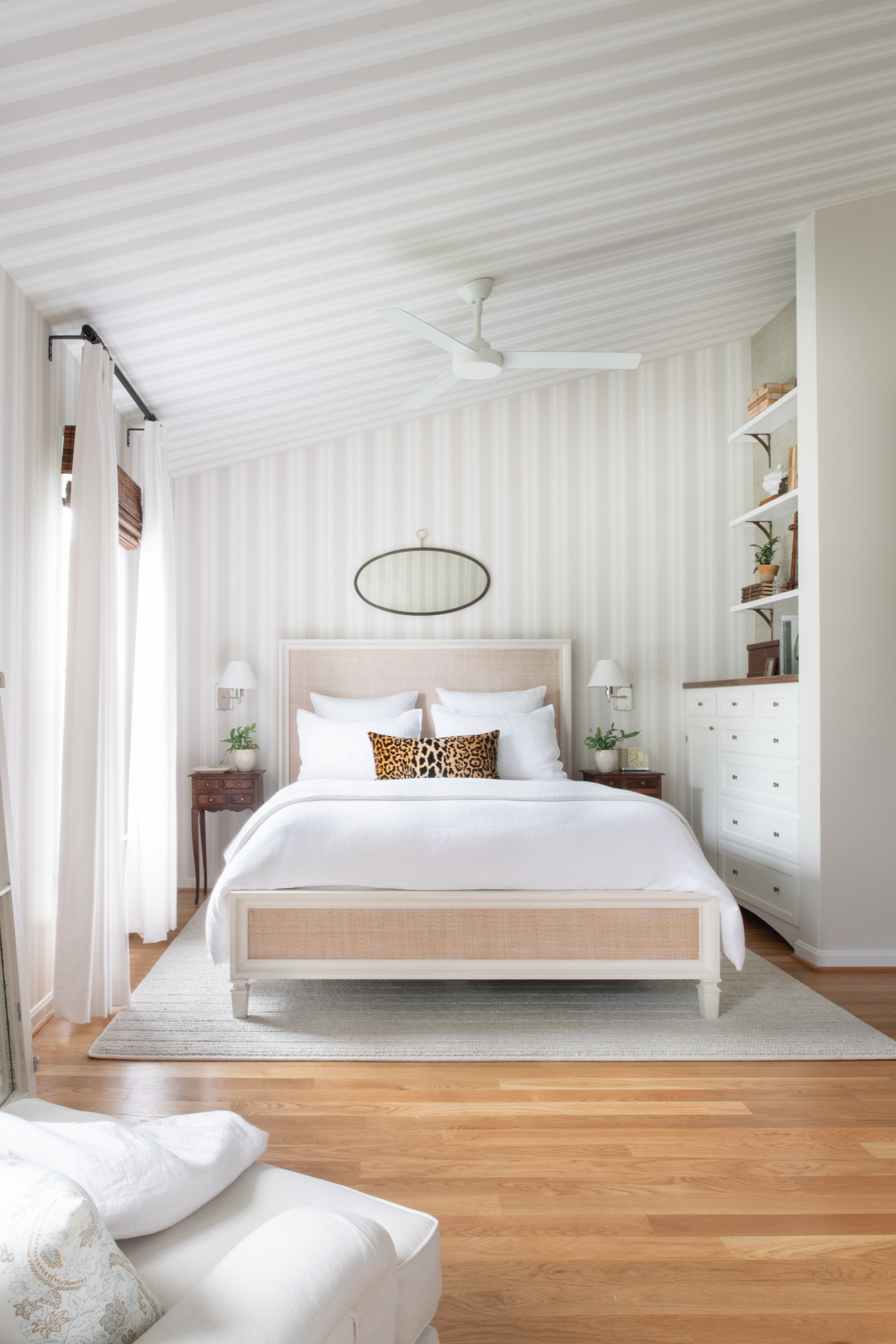 White and beige master bedroom with traditional wallpaper