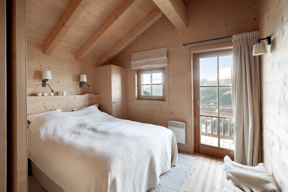 Design ideas for a rustic bedroom in Other with medium hardwood flooring.