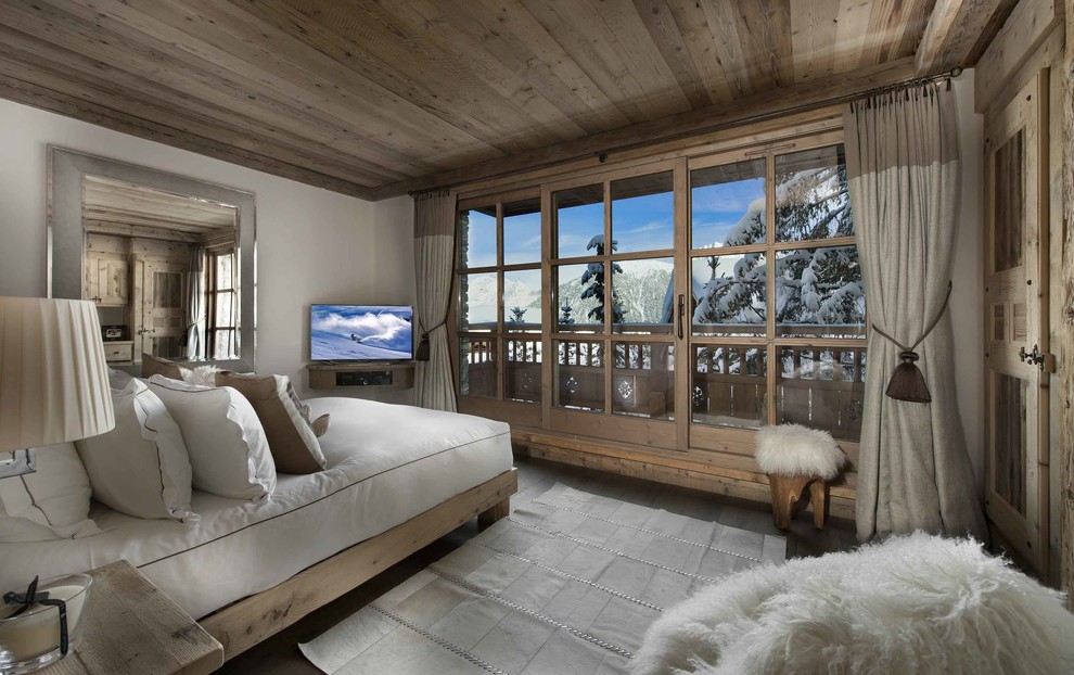 Example of a mid-sized mountain style guest bedroom design in London