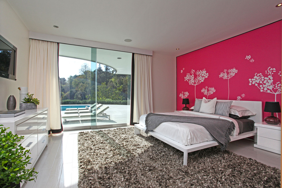 Inspiration for a mid-century modern painted wood floor bedroom remodel in Los Angeles