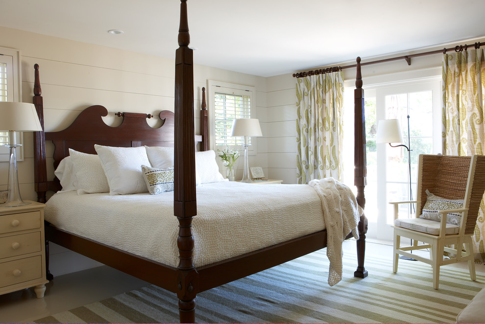 Example of a mid-sized cottage guest porcelain tile and beige floor bedroom design in Boston with white walls and no fireplace