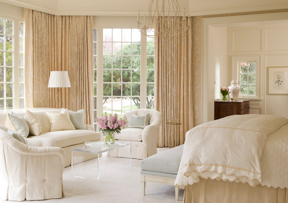Design ideas for a traditional master bedroom in Charlotte with carpet.