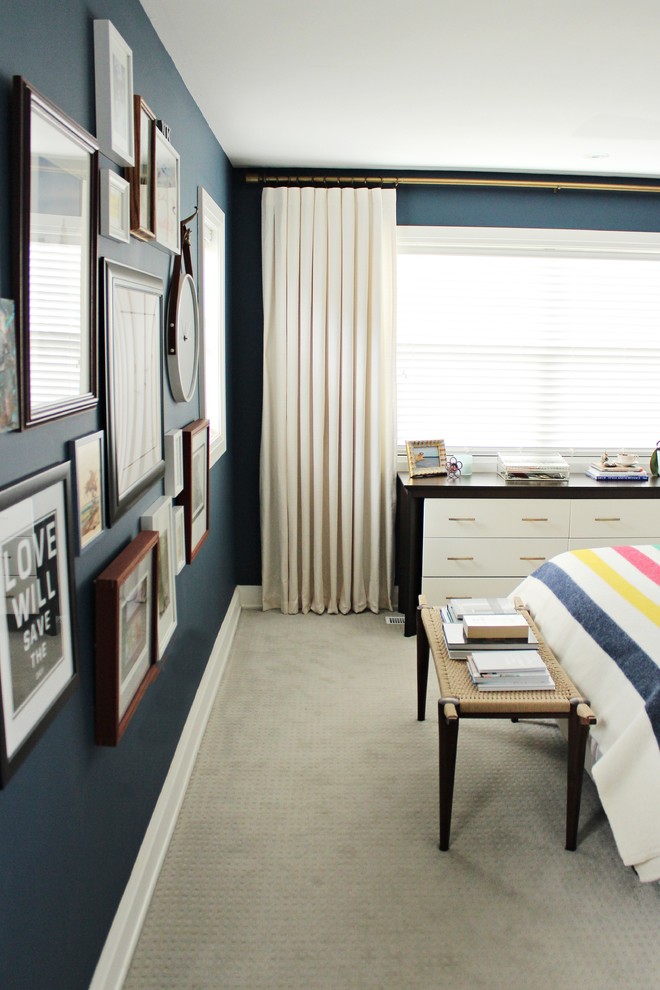 Photo of a medium sized master and grey and cream bedroom in Toronto with blue walls and carpet.