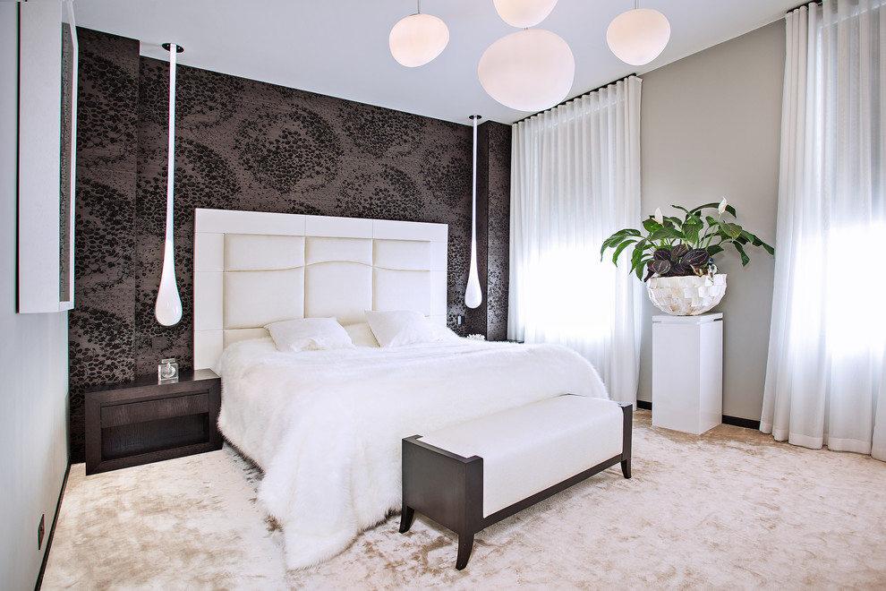 Example of a mid-sized transitional carpeted and beige floor bedroom design in London with gray walls