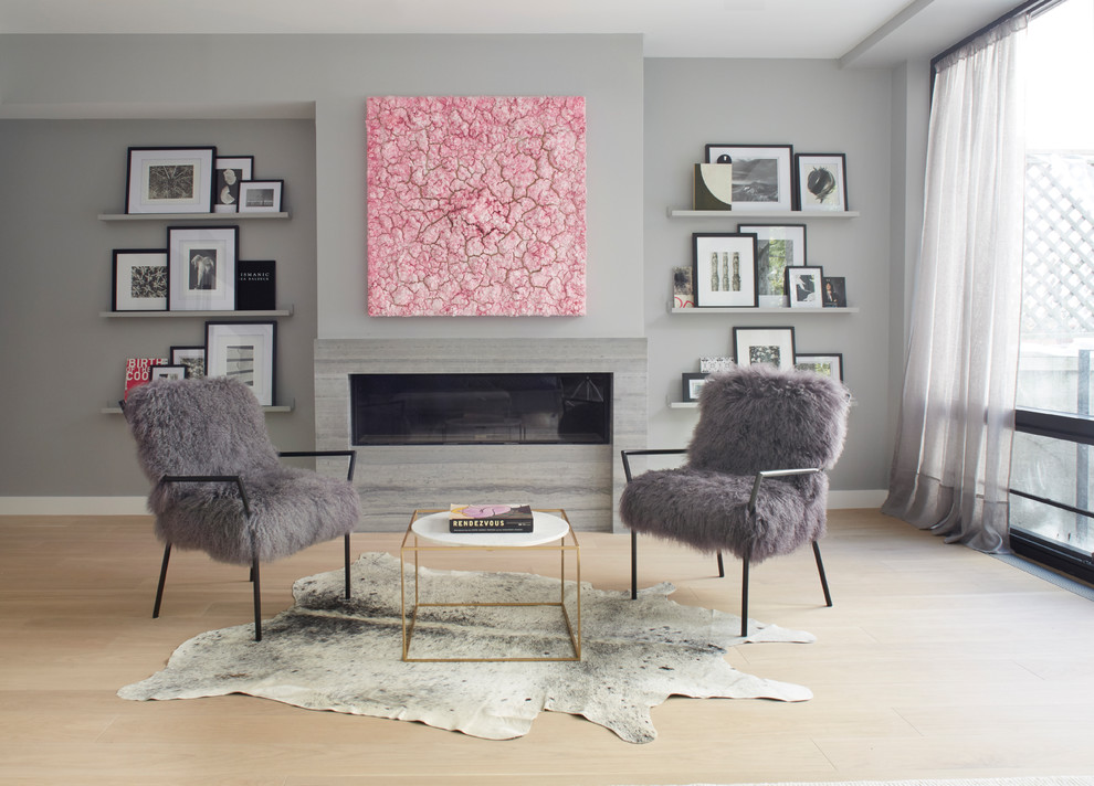 Inspiration for a large modern master and grey and pink bedroom in Other with grey walls, light hardwood flooring, a ribbon fireplace, a tiled fireplace surround and beige floors.
