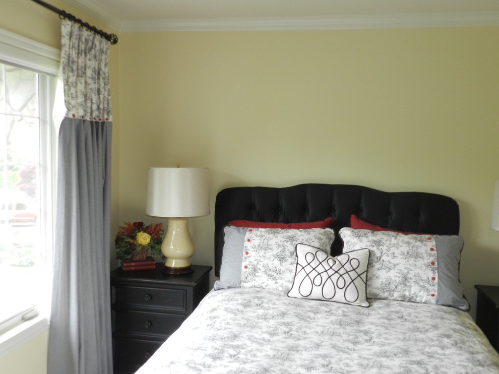 Example of a mid-sized classic guest carpeted bedroom design in Seattle with yellow walls and no fireplace