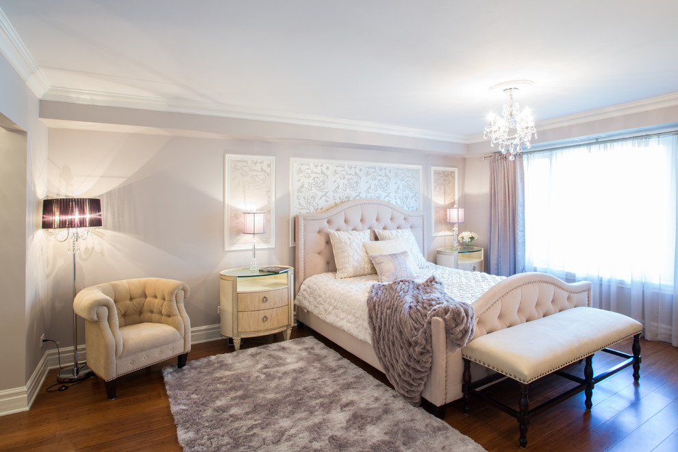 Photo of a classic bedroom in Boston with beige walls and dark hardwood flooring.