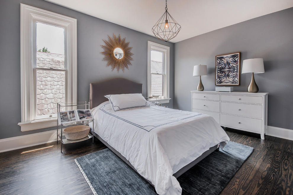 Bedroom - transitional guest dark wood floor and brown floor bedroom idea in Columbus with gray walls
