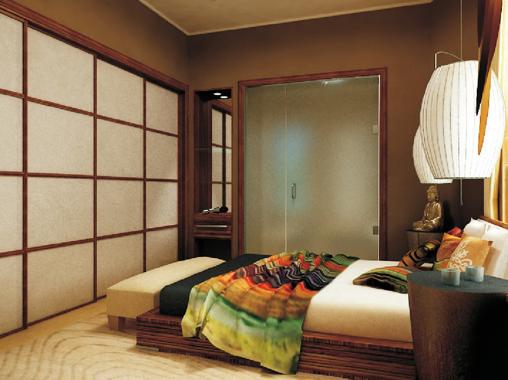 Esempio di una camera da letto etnica con pareti marroni