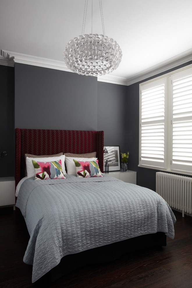 Bedroom - contemporary bedroom idea in London with gray walls