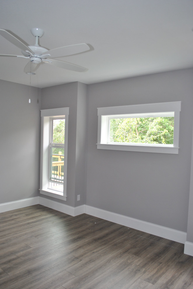 Imagen de habitación de invitados contemporánea de tamaño medio con paredes grises