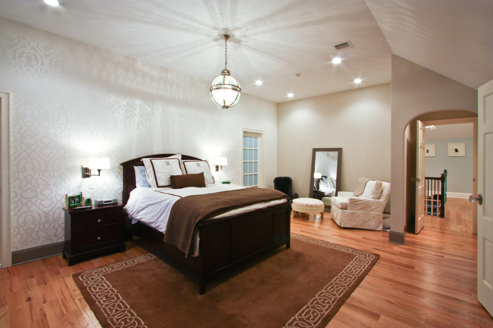 Bedroom - traditional medium tone wood floor bedroom idea in Newark with multicolored walls