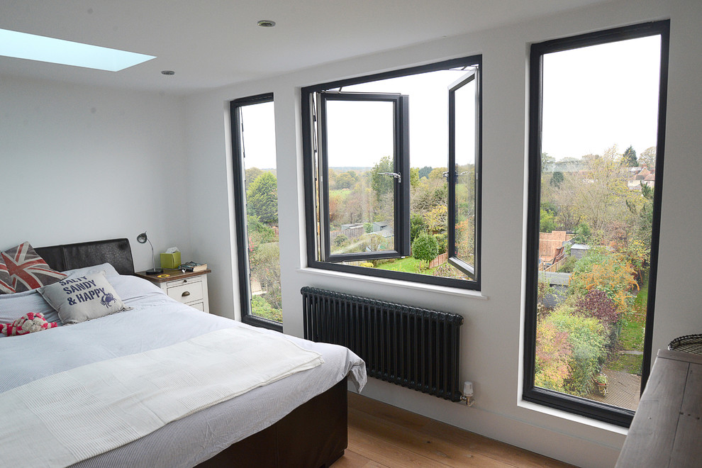 Photo of a classic bedroom in Surrey.