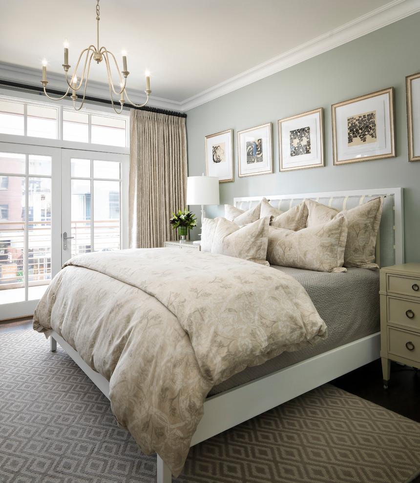 Large classic master bedroom in Denver with green walls, dark hardwood flooring and brown floors.