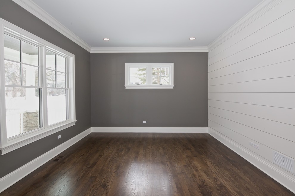 This is an example of a medium sized nautical guest bedroom in Chicago with grey walls, dark hardwood flooring and no fireplace.