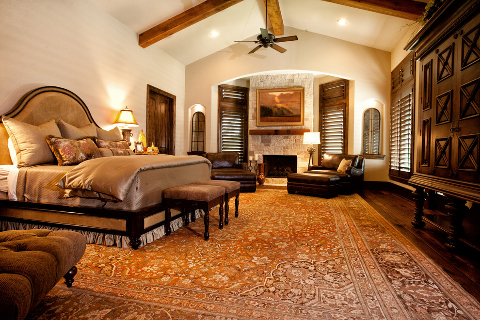 Large tuscan master bedroom photo in Houston