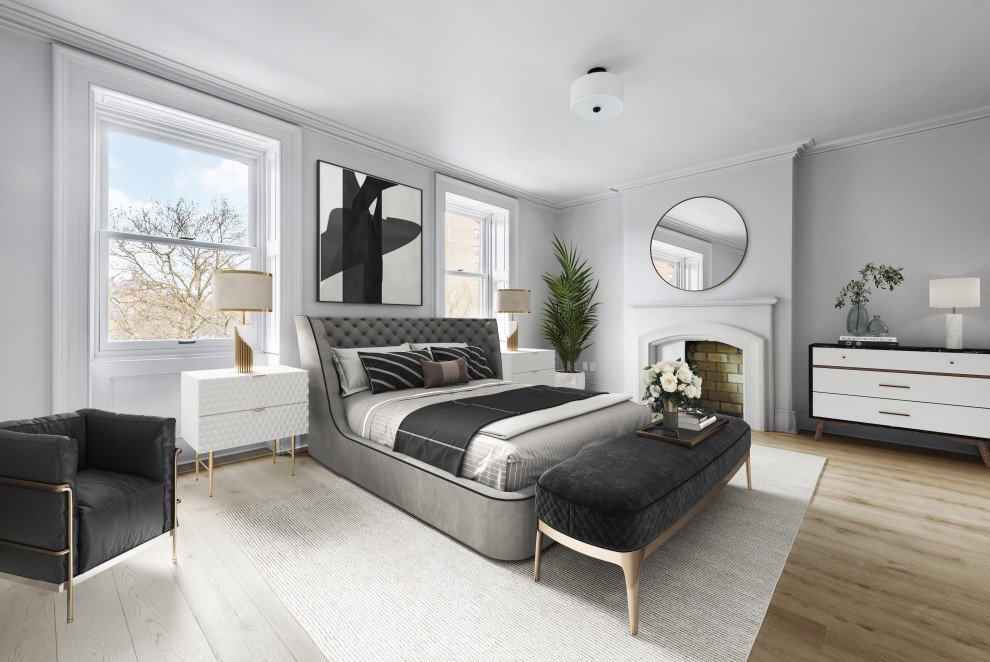 ニューヨークにある広いトランジショナルスタイルのおしゃれな客用寝室 (グレーの壁、淡色無垢フローリング、標準型暖炉、コンクリートの暖炉まわり) のインテリア